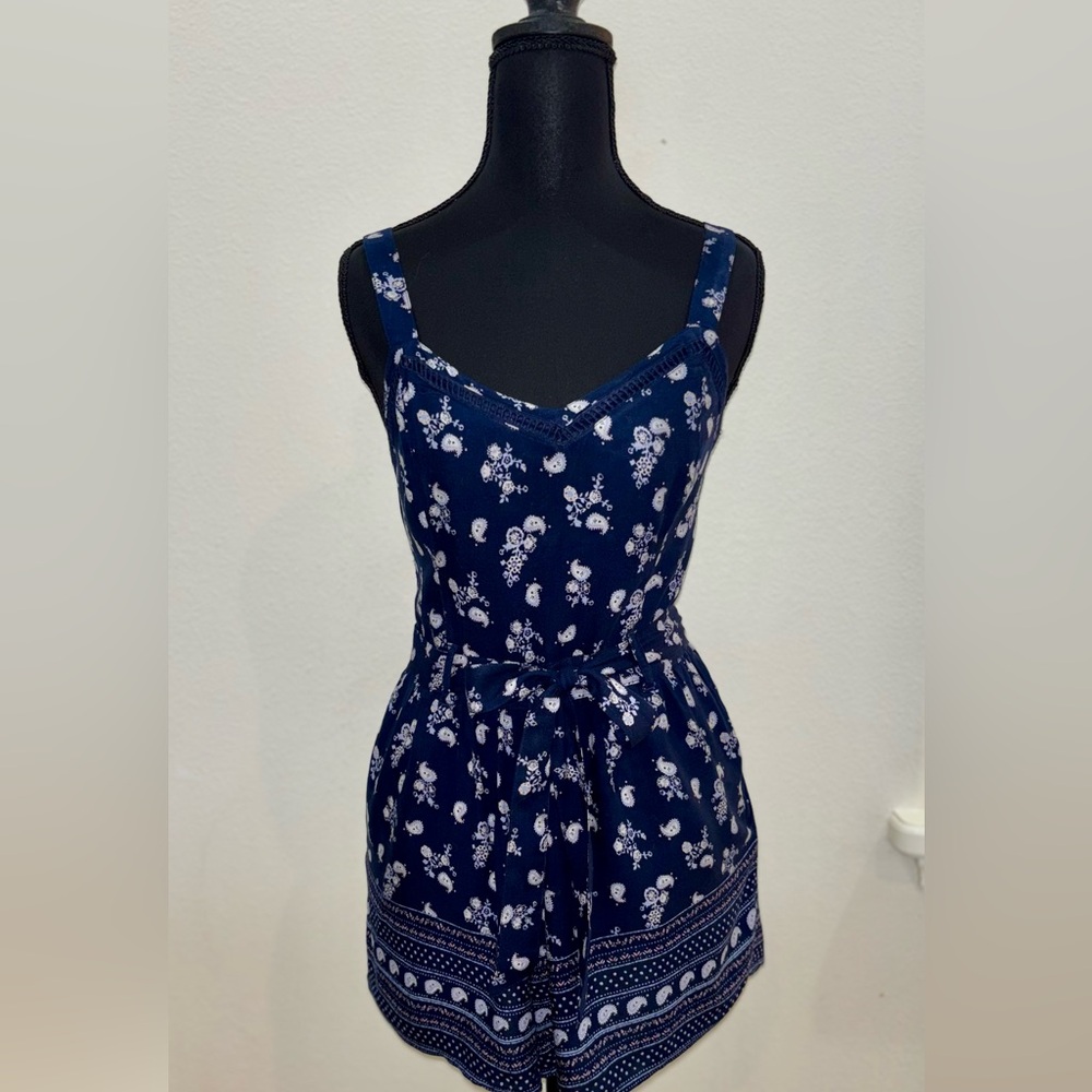 Hollister Navy Blue Floral Romper Size (S)
NWOT